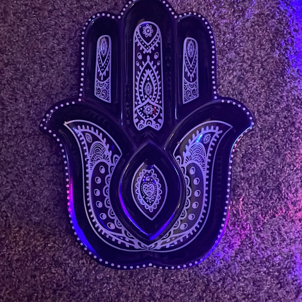 A blue hamsa hand for organization, hippie room decor